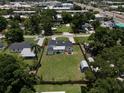 Beautifully maintained fenced property with mature trees and spacious yard at 2306 Cheryl Rd, Largo, FL 33771
