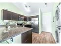 Kitchen featuring stainless steel appliances and granite countertops at 3002 W Cleveland St # B9, Tampa, FL 33609