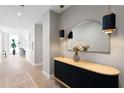Chic hallway featuring wood floors, soft decor and stylish lighting at 301 1St S St # 1601, St Petersburg, FL 33701