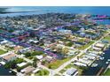 Aerial view of waterfront neighborhood and canal access to Gulf at 13931 King Ave, Hudson, FL 34667