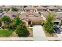 Aerial view of single-story home showing the well-kept lawn and neighborhood at 15682 Stone House Dr, Brooksville, FL 34604