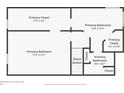 Floor plan of the primary suite including the bedroom, bathroom, and walk-in closets at 1830 Springwood N Cir, Clearwater, FL 33763