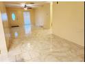 Bright living room showcasing new flooring and lots of natural light at 1918 Crown Park Dr, Valrico, FL 33594
