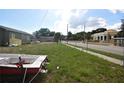 The property has a spacious yard with chain link fencing surrounding the perimeter at 3009 N 13Th St, Tampa, FL 33605