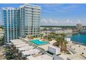 Rooftop pool with sun deck surrounded by lush landscaping offering panoramic city views at 5120 Marina Way # 15005, Tampa, FL 33611