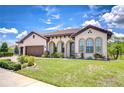 Charming single-story home with a lush green lawn and well-maintained landscaping at 4122 Natural Vista Ct, New Port Richey, FL 34655