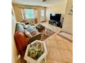 Comfortable living room with neutral tones and a cozy seating area at 5215 76Th N N St, St Petersburg, FL 33709