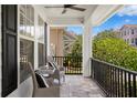 Relaxing front porch with comfortable seating and a view of the neighborhood at 10003 Brompton Dr, Tampa, FL 33626