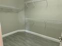 Walk-in closet equipped with wire shelving for maximized storage and organization at 1008 Arista Blvd, Valrico, FL 33594