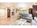 Inviting living room with tile flooring, neutral walls, and an open concept layout at 1626 Terra Ceia Bay Cir # 6, Palmetto, FL 34221