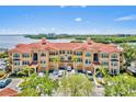 Stunning waterfront condos boast Mediterranean architecture, garage parking, and lush landscaping creating resort style living at 2739 Via Capri # 1039, Clearwater, FL 33764
