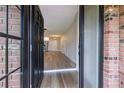 Open view from the front doorway featuring light-colored walls and attractive hard surface floors at 314 Circle Dr, Palm Harbor, FL 34683