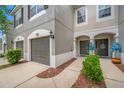 Townhouse with a neat walkway and a well-maintained exterior at 10208 Westpark Preserve Blvd, Tampa, FL 33625