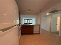 Open kitchen layout provides seamless flow to living area and modern appliances at 12300 Vonn Rd # 9105, Largo, FL 33774