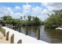 Scenic dock with calm water views, perfect for relaxing or water activities at 358 Highland Shores Dr, Ellenton, FL 34222
