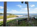 Path leads to the beach, offering an idyllic waterfront experience at 5000 Culbreath Key Way # 1-112, Tampa, FL 33611