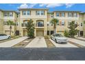 Beautiful townhouses each boast a private garage, private balcony, and tidy landscaping at 5521 Yellowfin Ct, New Port Richey, FL 34652