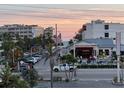 Balcony view featuring nearby beachfront businesses, including a Hilton Garden Inn at 6161 Gulf Winds Dr # 347, St Pete Beach, FL 33706
