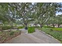 Exterior showcasing a tranquil public park with walkways, benches, and verdant landscaping in a peaceful community setting at 1 Beach Se Dr # 811, St Petersburg, FL 33701
