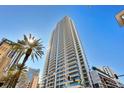 High-rise building showing multiple stories of balconies with water views and blue skies at 100 1St N Ave # 3905, St Petersburg, FL 33701
