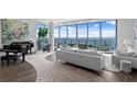 Well-appointed living room area with floor to ceiling windows and sweeping views at 100 1St N Ave # 3905, St Petersburg, FL 33701