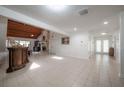 Spacious living room with stone fireplace and wood ceiling at 13851 Lake Point Dr, Clearwater, FL 33762