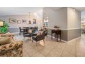 Spacious living room with tile flooring, a high ceiling, and stylish furnishings at 1222 Rainbrook Cir, Valrico, FL 33596