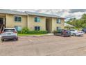 Well-maintained condo building with convenient parking and lush landscaping, creating a welcoming atmosphere at 4215 E Bay Dr # 1706A, Clearwater, FL 33764
