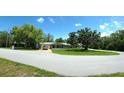 Charming home with a well-maintained yard and driveway at 9171 Vicksburg Rd, Spring Hill, FL 34608