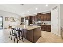 Spacious kitchen featuring a large center island and stainless steel appliances at 21837 Briske Morning Ave, Land O Lakes, FL 34637