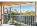 Enjoy pond views from this screened lanai, perfect for relaxing and enjoying the natural surroundings at 25050 Sandhill Blvd # 8B1, Punta Gorda, FL 33983