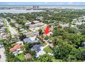 Aerial view of property's location showcasing lush greenery, proximity to bay, and neighborhood at 7802 134Th St, Seminole, FL 33776