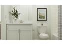 Cozy bathroom featuring classic sink and toilet design at 31616 Cardinal Yard Dr, San Antonio, FL 33576