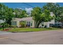 Charming single Gathering home with large yard and side entry two-car garage at 3516 W Santiago St, Tampa, FL 33629