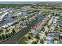 Breathtaking aerial view of waterfront community with canal access and stunning water views at 5710 Tortoise Pl, Apollo Beach, FL 33572