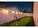 Backyard putting green, ideal for enjoying leisure time at home at 1242 Whisper Dr, Largo, FL 33770
