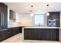 Contemporary kitchen with sleek cabinets and stainless steel appliances at 777 3Rd N Ave # 1603, St Petersburg, FL 33701