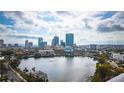 Expansive cityscape view overlooking tranquil lake under cloudy blue skies at 777 3Rd N Ave # 1703, St Petersburg, FL 33701