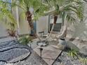 Front yard features a seating area and unique landscaping at 10924 Summerton Dr, Riverview, FL 33579