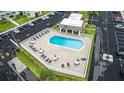 Community pool surrounded by tables and chairs, with parking and a restroom nearby at 1250 S Pinellas Ave # 207, Tarpon Springs, FL 34689