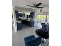 Stylish kitchen featuring navy blue cabinets and stainless steel appliances for cooking at 2306 41St E St, Bradenton, FL 34208