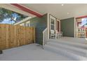 Covered front porch with seating, offering a cozy outdoor space to relax at 1435 Prescott S St, St Petersburg, FL 33712