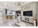 Stylish living room featuring modern decor, neutral tones, and an open floor plan at 26835 Juniper Bay Dr, Wesley Chapel, FL 33544