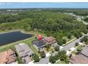 Aerial view of the house and neighborhood, with the location of the house pinned to its roof at 3477 Barbour Trl, Odessa, FL 33556