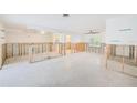 Expansive living area with lots of open space and natural light from the windows and doors at 3928 E Eden Roc Cir, Tampa, FL 33634