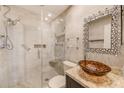 Beautifully renovated bathroom showcasing a vessel sink, glass shower, and modern tile at 6237 50Th N Ave, St Petersburg, FL 33709