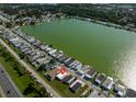 Aerial view showcases this lovely community with a lake view, highlighting the property's location at 8443 Fantasia Park Way, Riverview, FL 33578