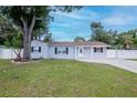 Charming single-story home with a well-maintained lawn, inviting entrance, and driveway at 4317 S Hale Ave, Tampa, FL 33611