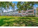 The meticulously maintained backyard and green space provide a serene view for residents at 2254 Norwegian Dr # 22, Clearwater, FL 33763