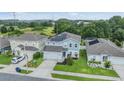 Lovely home with solar panels, landscaped yard, and inviting curb appeal in a Gathering-friendly neighborhood at 2073 Branding Iron Way, New Port Richey, FL 34655
